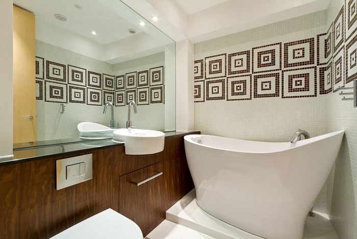 Грамотный дизайн способен визуально увеличить площадь ванной комнаты.