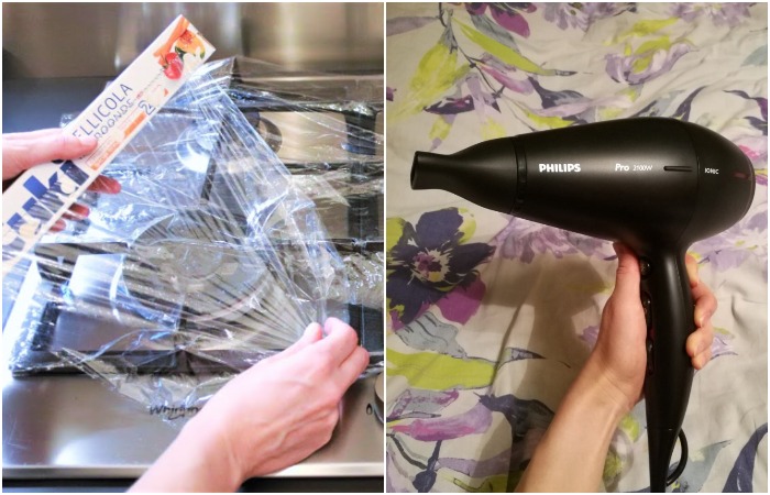 Накройте плиту пищевой пленкой и прогрейте феном