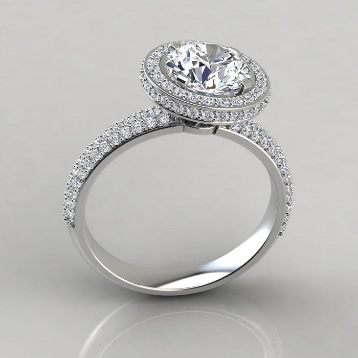 Помолвочное кольцо в стиле гало. / Фото: puregemsjewels.com