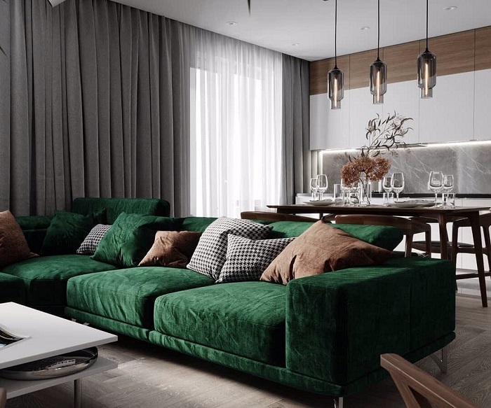 Изумрудный диван станет акцентом в комнате. / Фото: almode.ru