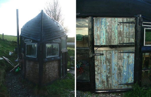 Дом из окон и дверей с лодкой вместо крыши 