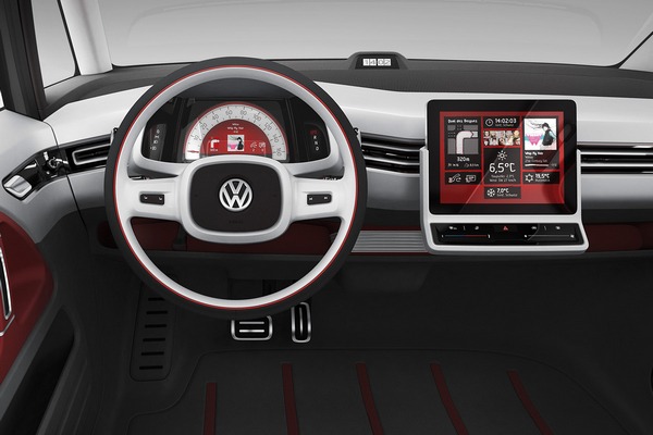Volkswagen Bulli 2013 - яркий пример того, как некоторые дизайнеры стараются вернуться в классическому внешнему виду приборной панели. Торпеда выполнена в минималистическом стиле. Справа расположен бортовой компьютер, который установили вне приборки