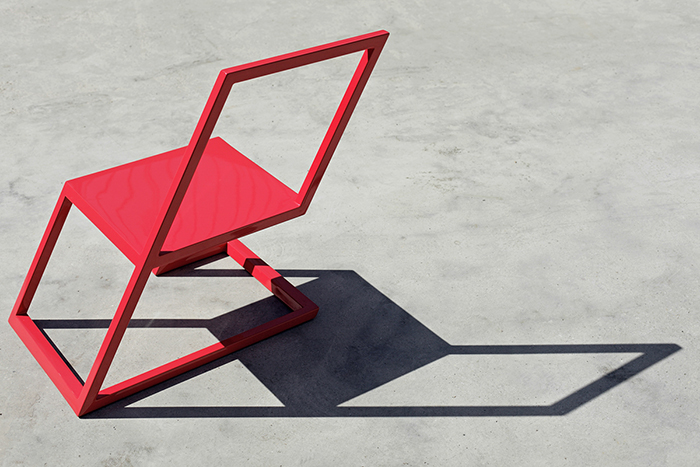 Красный стул от студии XYZ Integrated Architecture.