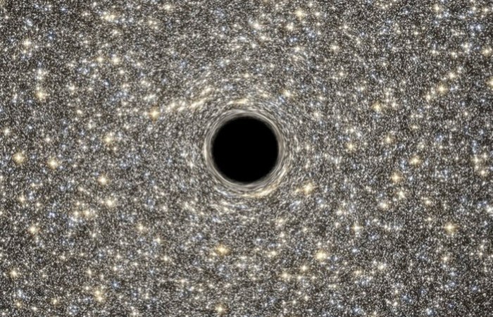 Крошечная галактика с огромной черной дырой.