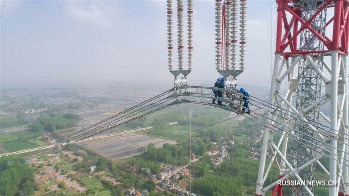 Работы на высоте птичьего полета. |Фото: china.org.cn.
