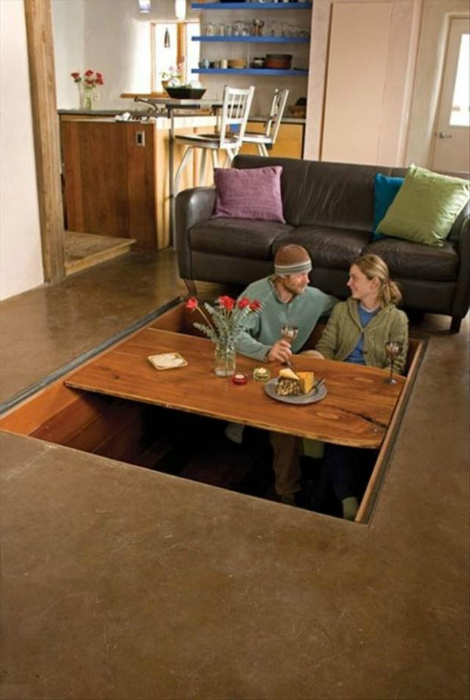 Обеденный стол, скрытый в полу.