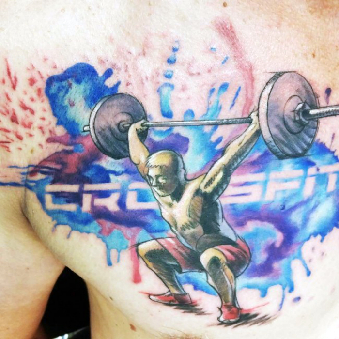 Акварельная татуировка с изображением тяжелоатлета.
