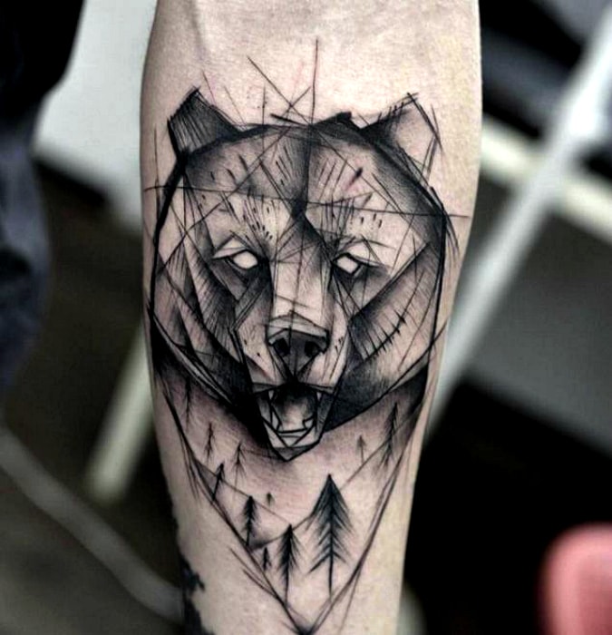 Татуировка с изображением морды медведя.