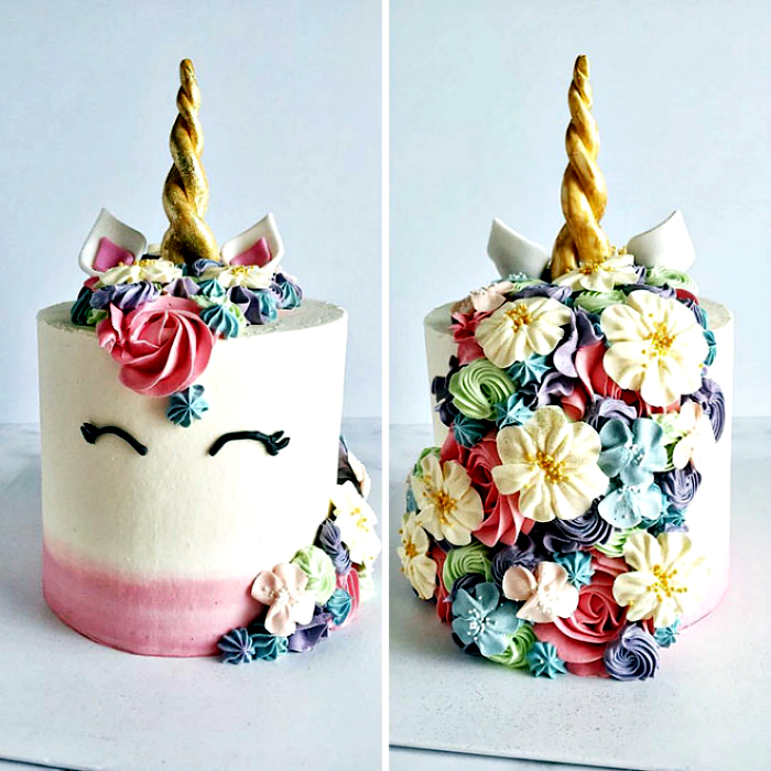 Тортик в виде единорога, украшенного цветами.