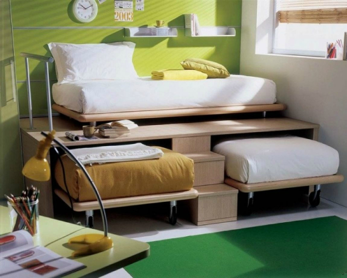 Детские кровати, спрятанные в подиум, отлично подойдут для маленькой комнаты.
