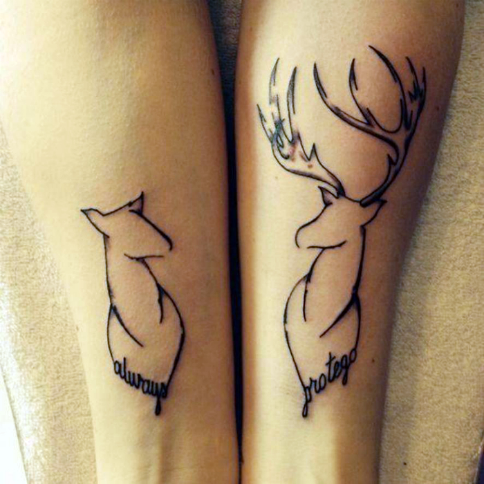 Парные татуировки с изображениями силуэтов оленя и оленихи.