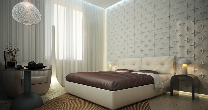 Уютная атмосфера спальни с прекрасной белой текстурированной стеной.