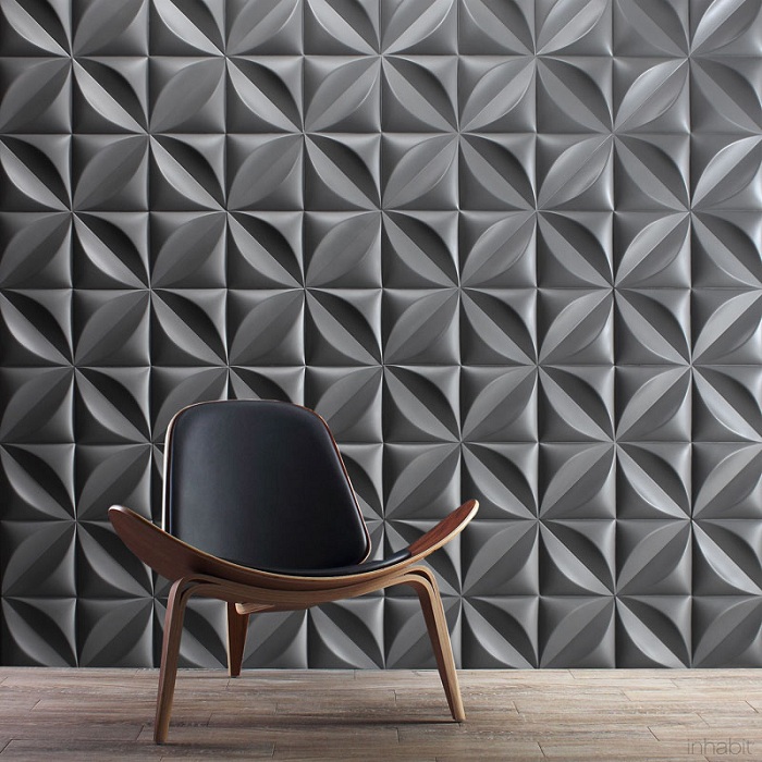 Интересный темный дизайн комнаты создан при помощи органических литых бетонных плит.