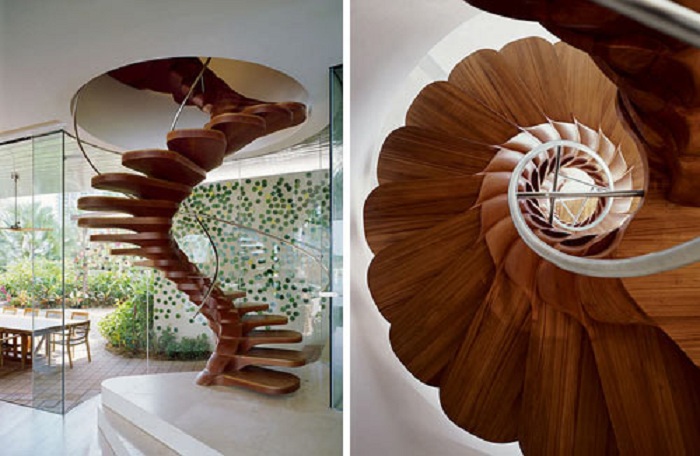 Спиральные деревянные лестницы не только выглядят очень утонченно, но и весьма функционально.
