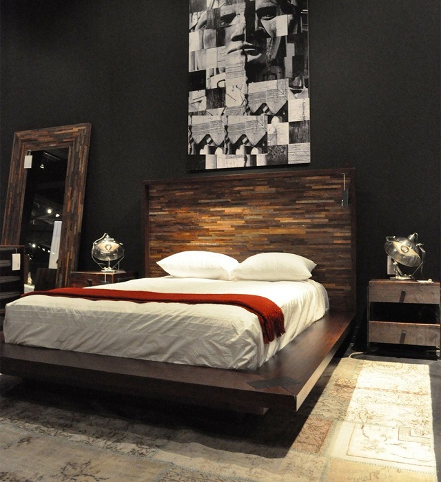 Практичная идея декорировать интерьер спальной в темных оттенках.