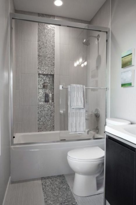 Серые оттенки в современном интерьере ванной комнаты - воплощение элегантности и сдержанности.
