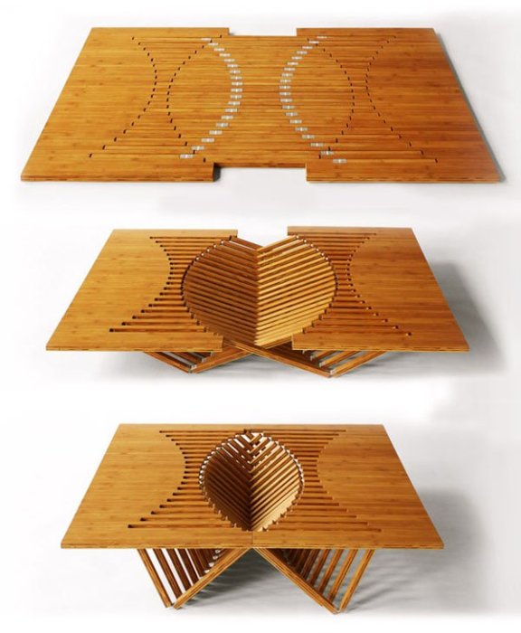 Раскладной деревянный журнальный столик поможет значительно сэкономить пространство в малогабаритной квартире.