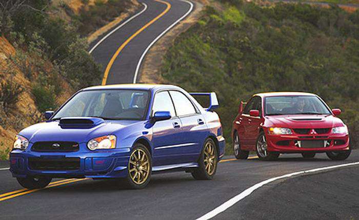 Раллийные самураи Subaru Impreza WRX STi и Mitsubishi Lancer Evolution.