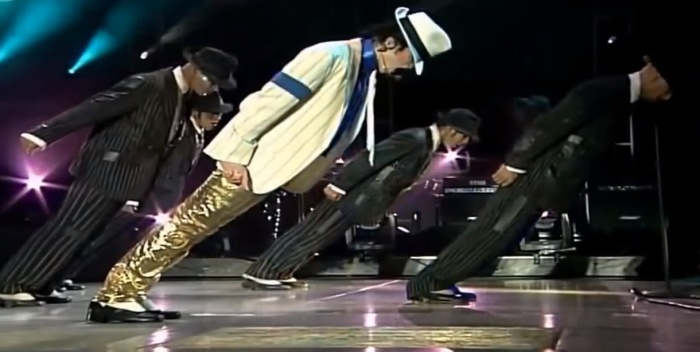 Michael Jackson и подтанцовка исполняют «антигравитационный» трюк.