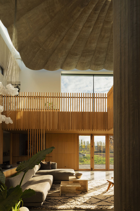 Зона гостиной в удивительном доме «75.9». | Фото: worldarchitecture.org.