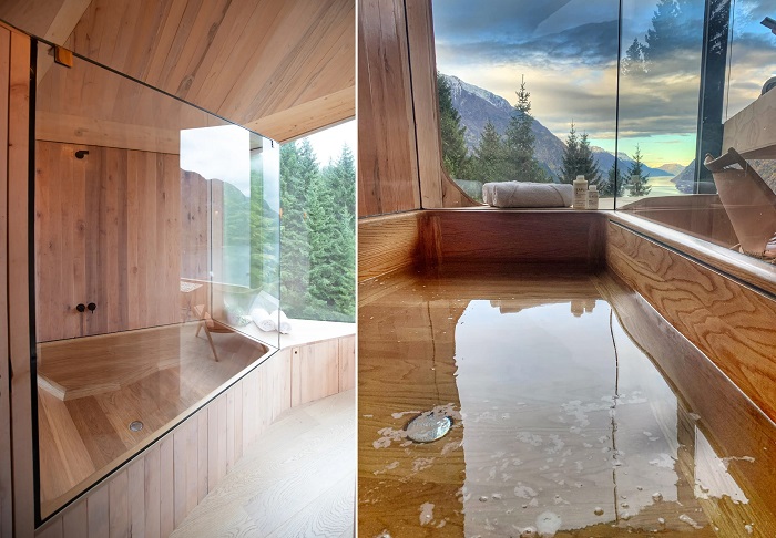 Рядом с гостиной, за стеклом, установлена деревянная ванна ручной работы (Woodnest Mountaintops, Норвегия).
