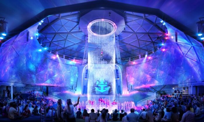 Под стеклянным куполом Icon of the Seas с высоты 17 метров падает потрясающий водопад с музыкальным сопровождением и подсветкой. | Фото: royalcaribbeanincentives.com.