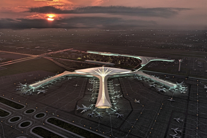 В темное время суток из окон пробивается яркое освещение, подчеркивая структуру пера (концепт Changchun's Longjia International Airport). | Фото: worldarchitecture.org.