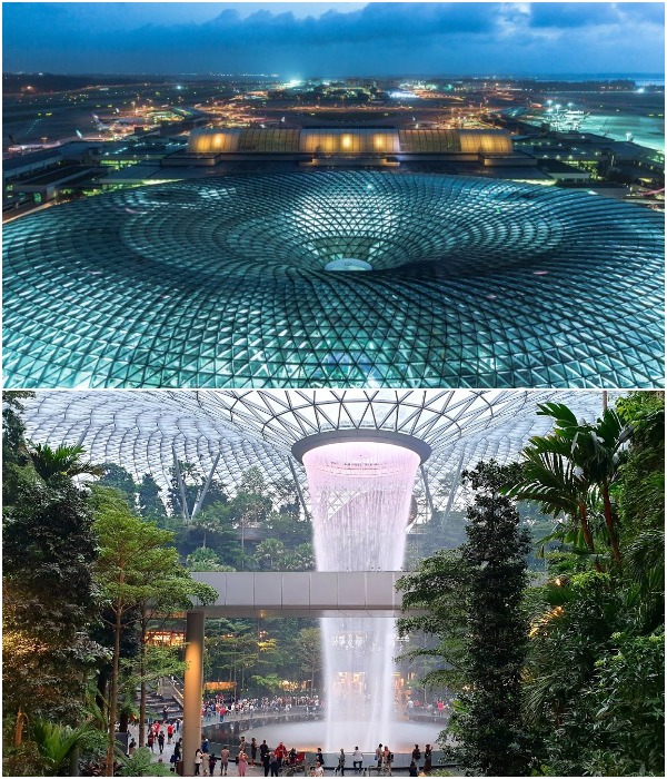 Правильный расчет и гигантская площадь крыши позволяет собрать максимальное количество осадков для создания водопада (Rain Vortex, Сингапур).