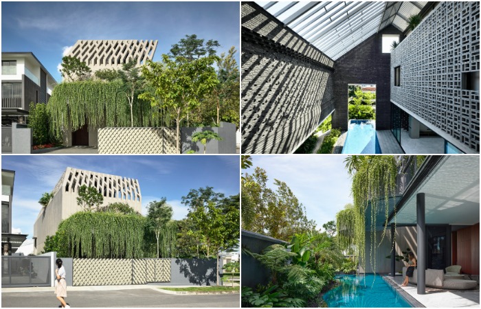 В Сингапуре дом спрятали за бетонной решеткой и стеной экзотической зелени, спасающих от палящих лучей солнца (Concrete Yin Yang House).