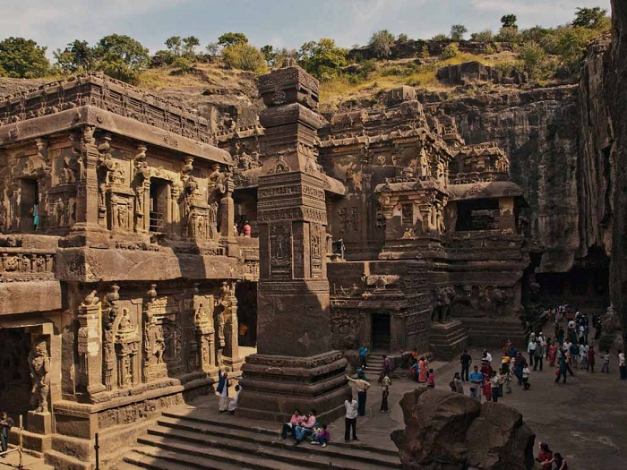 It looks like a temple carved into the depths of the rock (Temple Kailash, India).