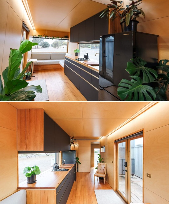 Кухня со стильным гарнитуром и  современной бытовой техникой. 