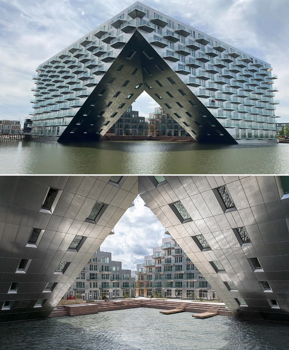 Со стороны озера консольная конструкция образовывает огромные ворота, через которые можно на лодке попасть на территорию комплекса Sluishuis (Амстердам, Нидерланды). 