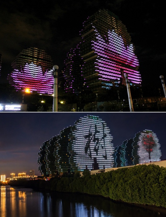 Ночное световое представление на фасадах небоскребов туристического комплекса Sanya Beauty Crown Hotel Tower.