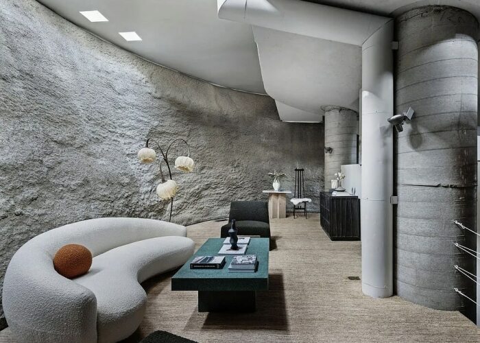 Несмотря на «пещерное» оформление стен и потолка дизайн интерьера может быть и современным (Geodesic Dome House, Лос-Анджелес). | Фото: beyondshelter.com.