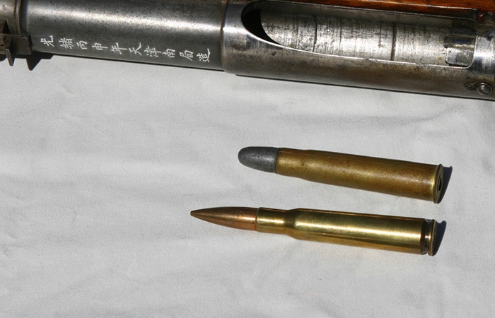 Китайский оригинальный патрон в сравнении с .50 калибром